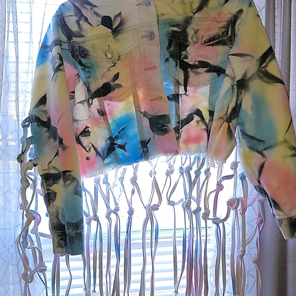 A Denim Cropped Jacket.  Size Meduim, Never Worn.